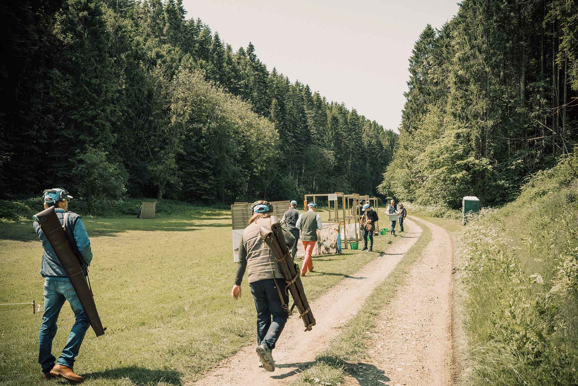 Teams walking to the stands at the 2025 Clay Day