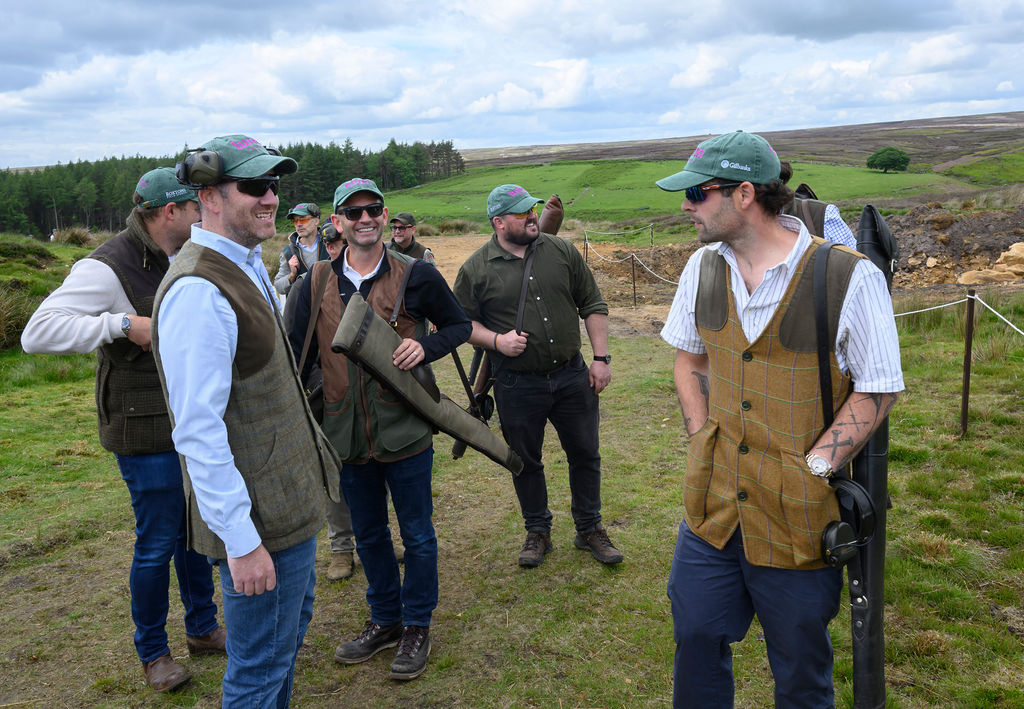 Guests talking on the moor at the 2026 Clay Day