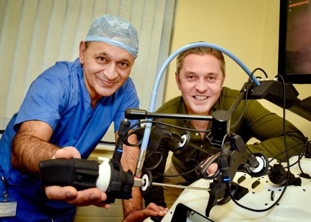 Chair of Trustees Alex Duckett and Consultant Paediatric Surgeon Mr Naved Alizai with the Laparo Apex at Leeds Children's Hospital